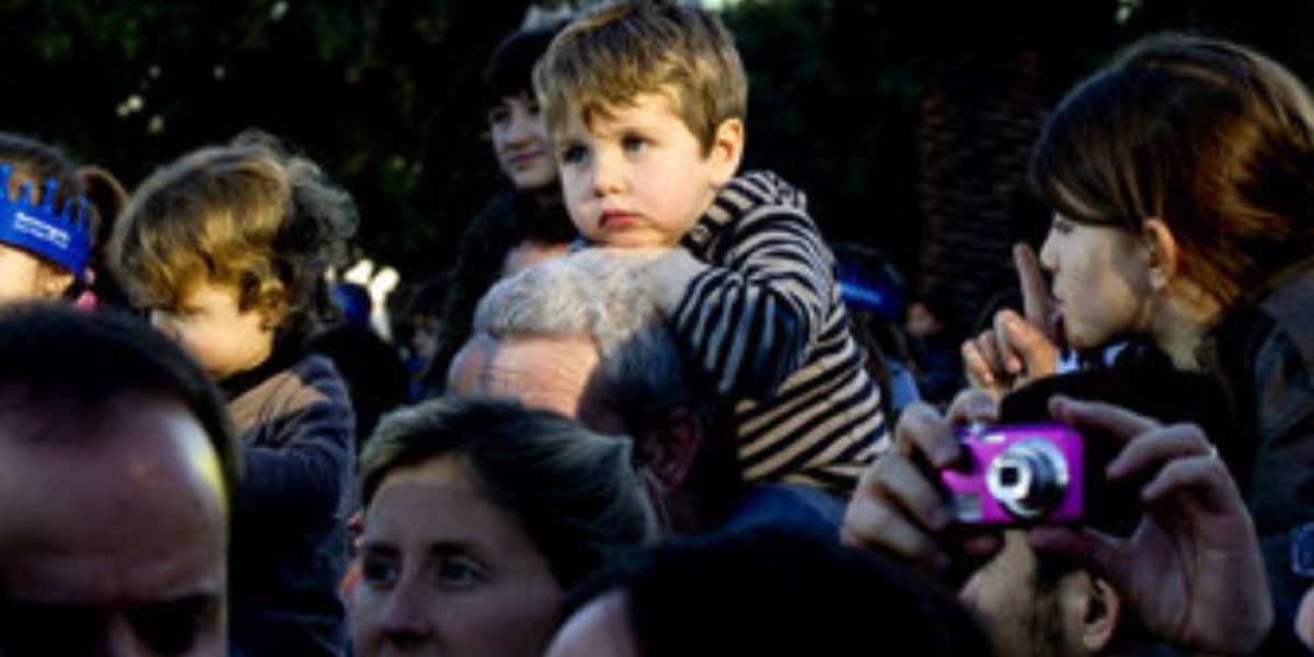 Dolor de Espalda por cargar niño a hombros